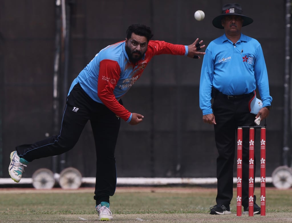 Kuwait’s Adnan Idrees picked up the wicket of Anshuman Rath. Photo: Jonathan Wong