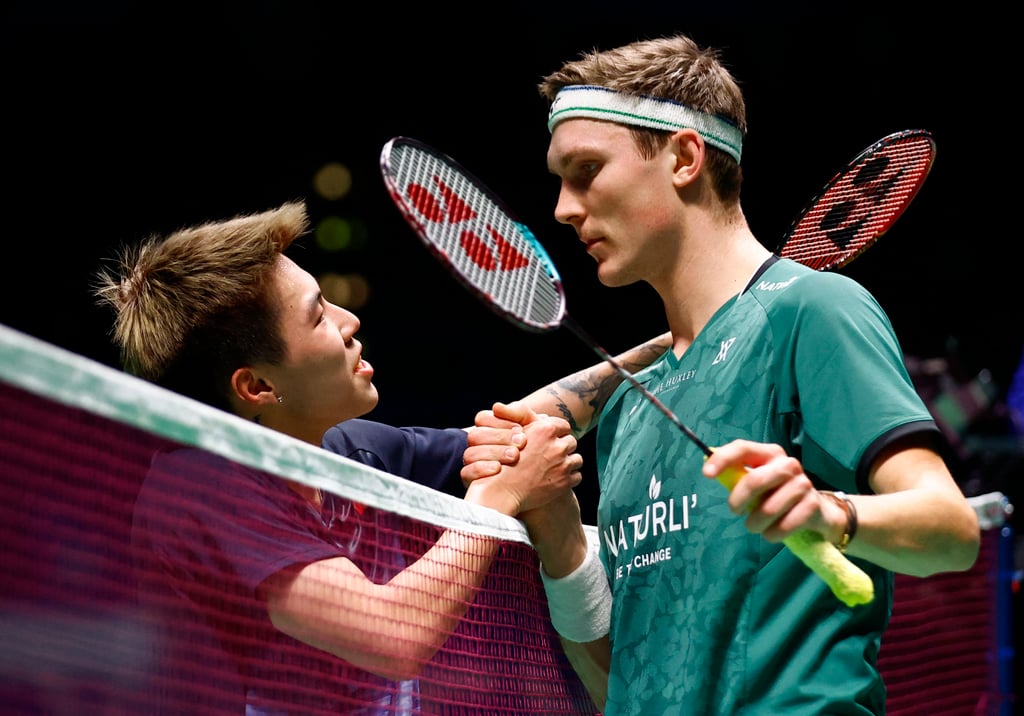 Viktor Axelsen shakes hands with Lee Cheuk-yiu after beating the Hongkonger. Photo: Action Images via Reuters