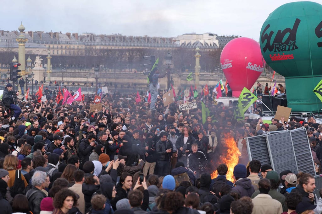Protesters gather during a demonstration in Paris on Thursday. Photo: Agence France-Presse Protesters gather during a demonstration in Paris on Thursday. Photo: Agence France-Presse