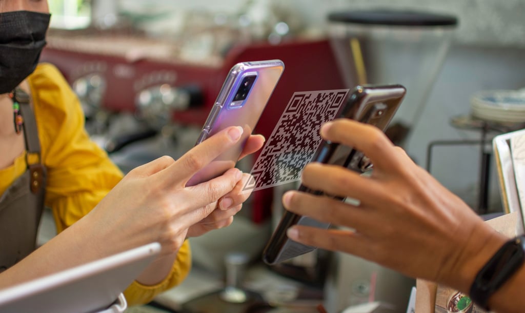A QR code being scanned at a restaurant. Photo: Shutterstock