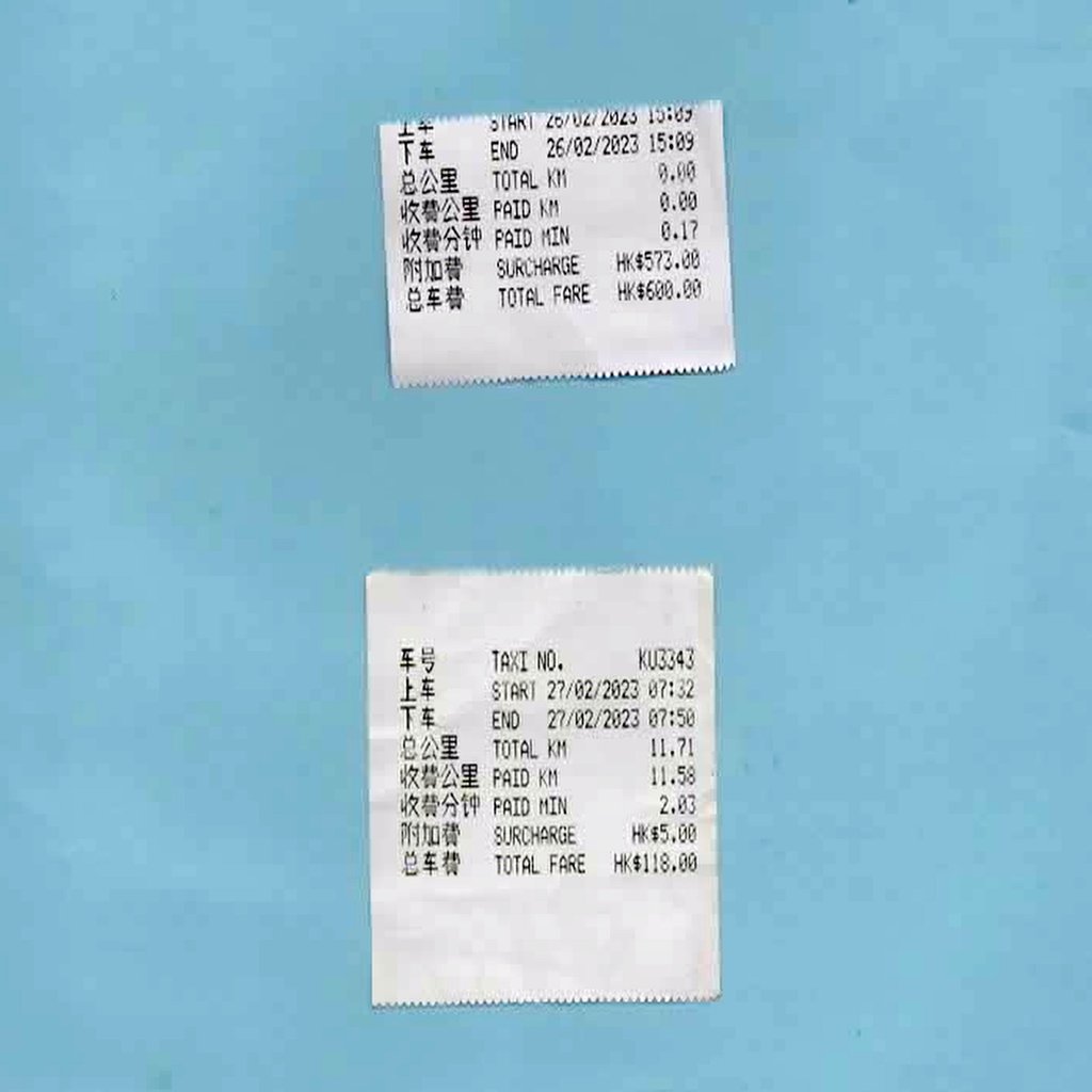 The receipt of Toczek’s first trip (top) shows an HKD$573 surcharge with the car plate number cut off, while a receipt he got from another driver on a separate trip (below) indicates all the information about the ride. Photo: Handout The receipt of Toczek’s first trip (top) shows an HKD$573 surcharge with the car plate number cut off, while a receipt he got from another driver on a separate trip (below) indicates all the information about the ride. Photo: Handout