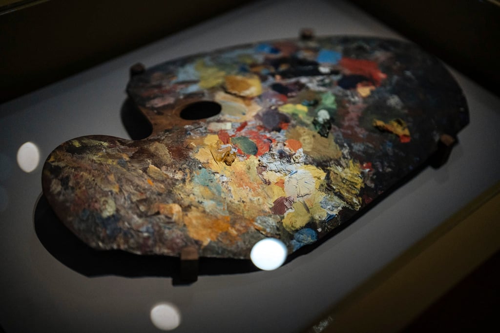 A painting pallet belonging to Claude Monet features in the exhibition. His big brother Leon was responsible for creating the cutting-edge synthetic colour palette key to the painter’s success. Photo: AP A painting pallet belonging to Claude Monet features in the exhibition. His big brother Leon was responsible for creating the cutting-edge synthetic colour palette key to the painter’s success. Photo: AP