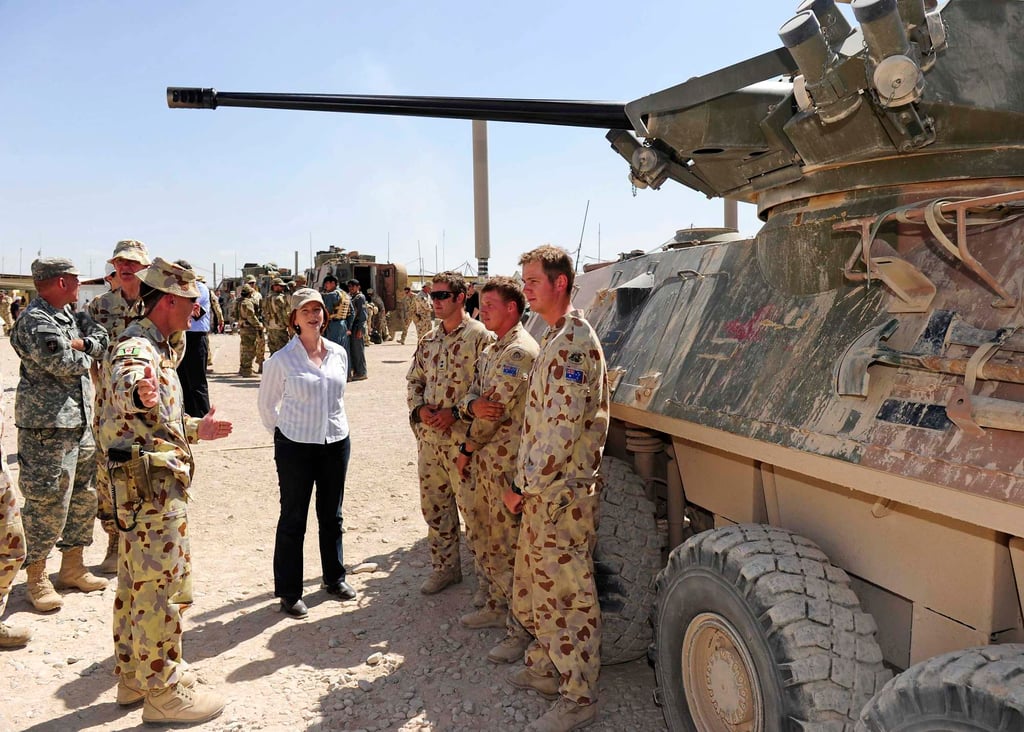 Australia’s then-Prime Minister Julia Gillard meets Australian troops during a visit to a base in southern Afghanistan in 2010. Photo: Australian Department of Defence Handout via Reuters
