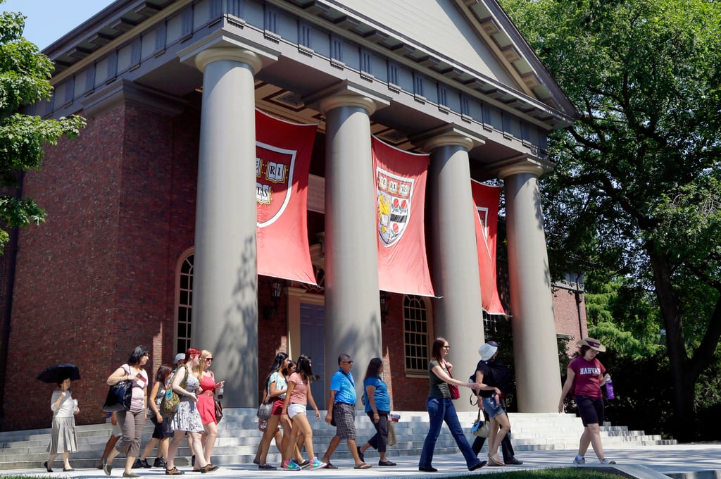 A group of students take a tour through the campus of Harvard University in the United States. Photo: AP