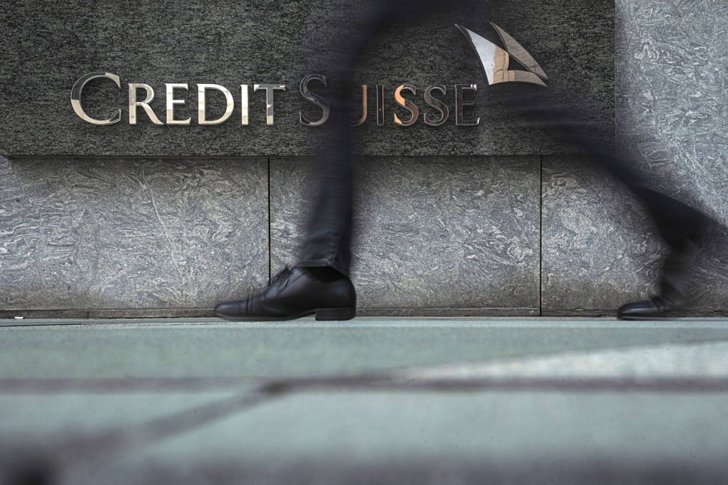 Signage for Credit Suisse Group outside a building in Hong Kong. Photo: Bloomberg