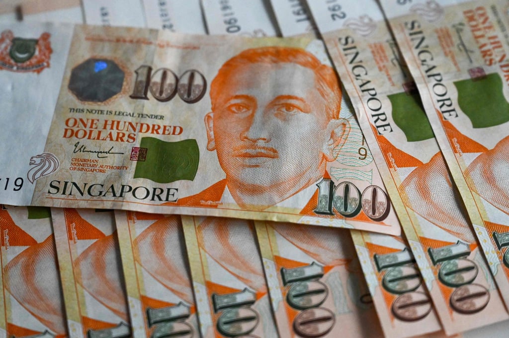 Given the rising costs of operations, 69 per cent of companies surveyed indicated that they would be ready to relocate their personnel out of Singapore. Photo: AFP