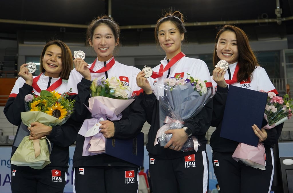 The Hong Kong team celebrate silver at the Asian Championships last year. Photo: FIE