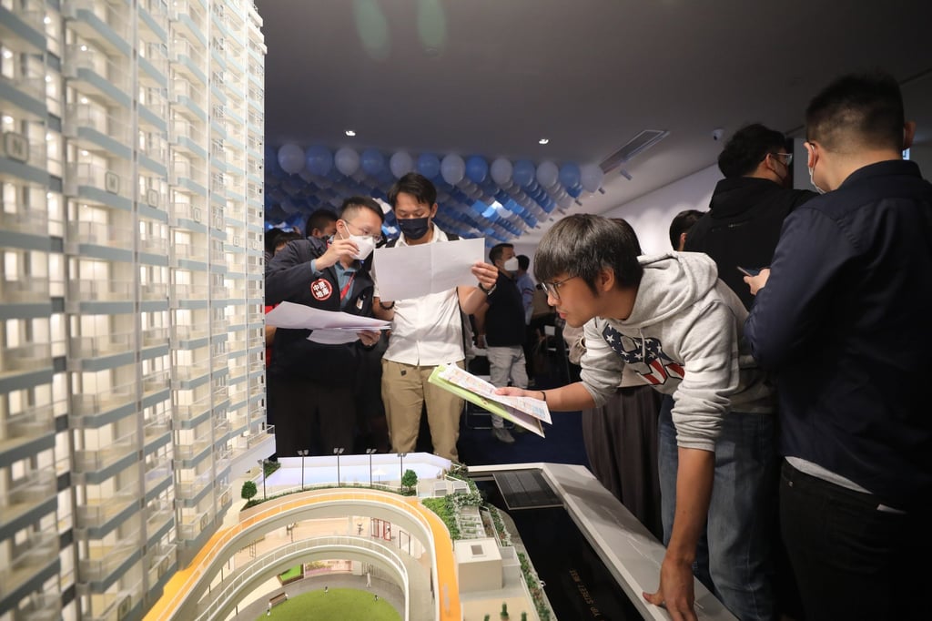 Prospective homebuyers look at a scale model of Star Properties’ After the Rain residential project coming up at 21 Wang Yip Street West, Yuen Long. Photo: Xiaomei Chen Prospective homebuyers look at a scale model of Star Properties’ After the Rain residential project coming up at 21 Wang Yip Street West, Yuen Long. Photo: Xiaomei Chen