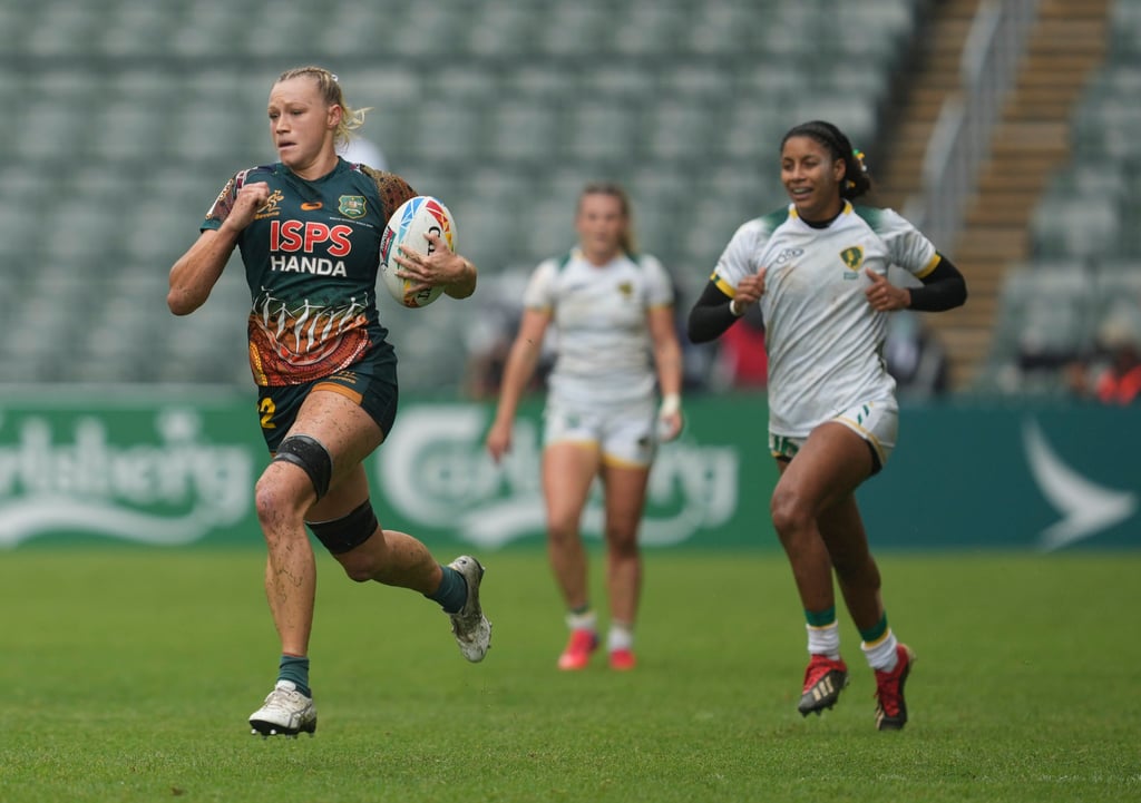 Australia’s Maddison Levi runs away to score a try against Brazil. Photo: Sam Tsang