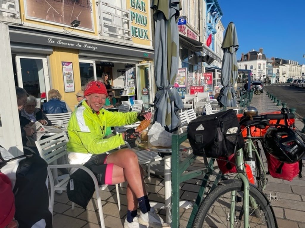 Nelson fuels up as she cycles through France. Photo: Nell Nelson