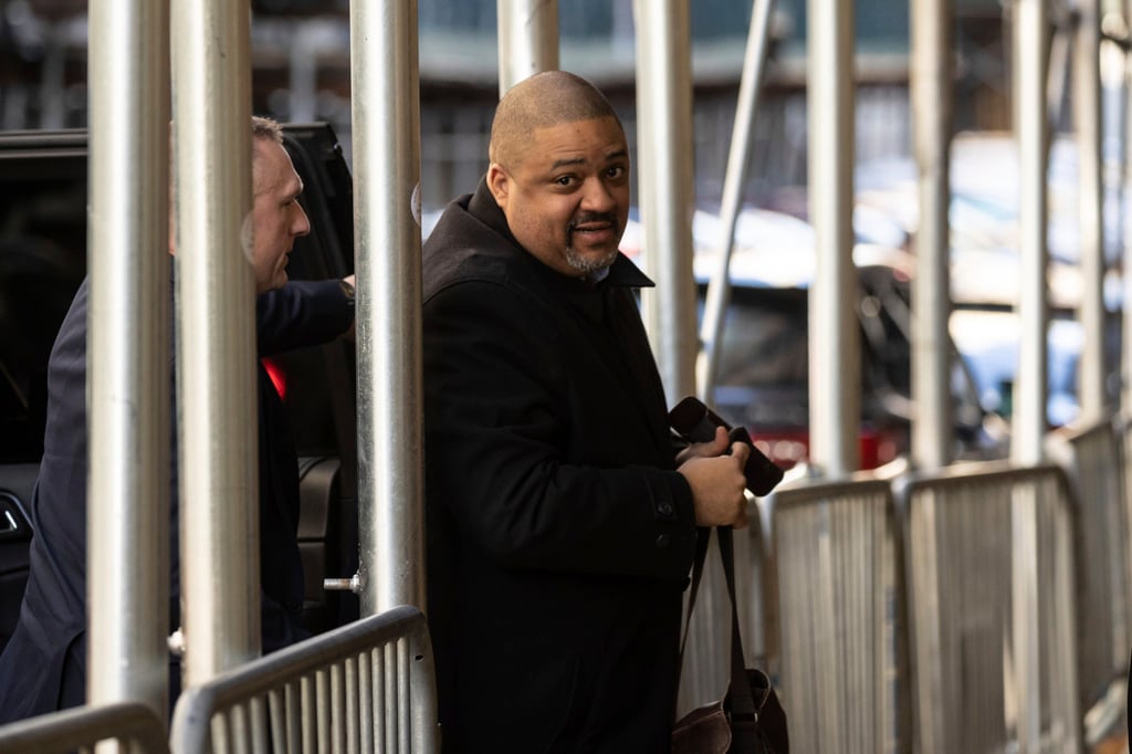 Manhattan District Attorney Alvin Bragg (centre) arrives at the District Attorney’s office in New York on Thursday. Photo: AP