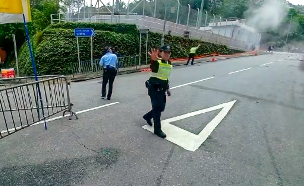 A screen capture of a dashcam video shows police officers on the street in the aftermath of the incident. Photo: Facebook/Bosco Chu