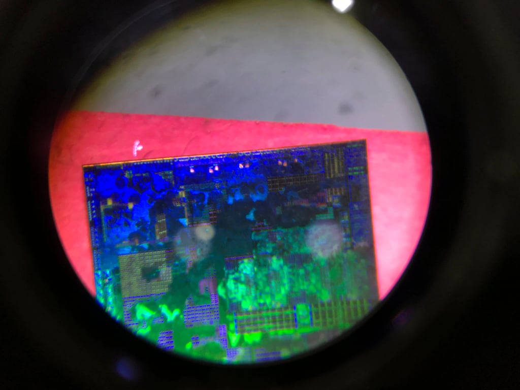 A Chinese microchip is seen through a microscope. Photo: AP