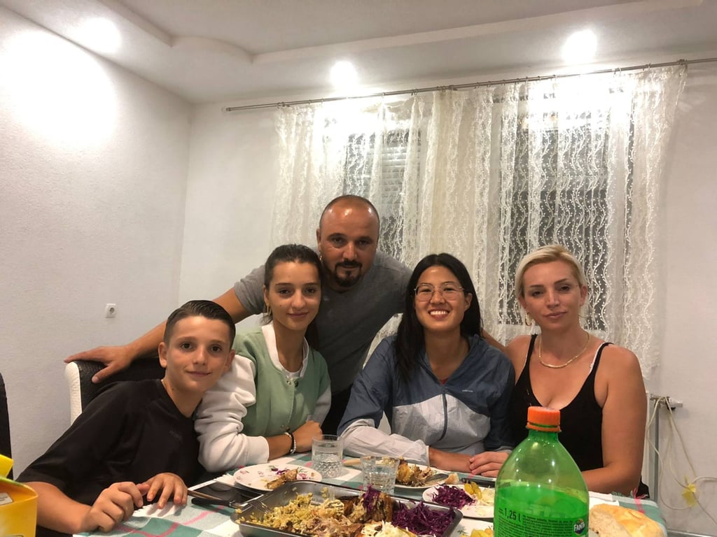 Qiu embarked on a 7,500km cycling journey across 10 countries, and was welcomed by families including this one in Kosovo. Photo: Sara Qiu Ruan Qiu embarked on a 7,500km cycling journey across 10 countries, and was welcomed by families including this one in Kosovo. Photo: Sara Qiu Ruan