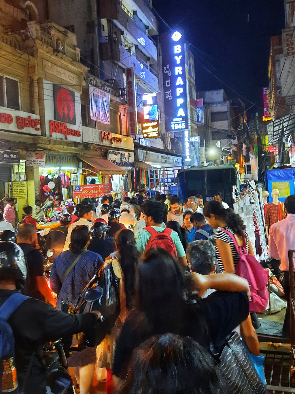 The group walks through a crowded portion of OTC Road in Bangalore. Photo: Anita Rao Kashi The group walks through a crowded portion of OTC Road in Bangalore. Photo: Anita Rao Kashi