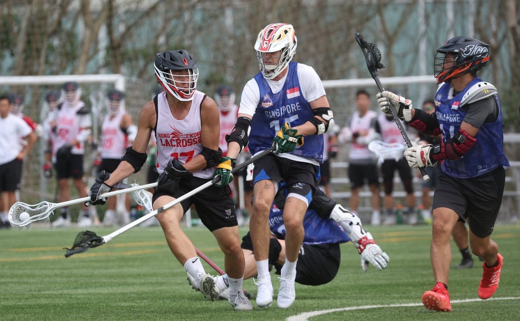 Hong Kong’s Joey Au Yeung (left) in action against Singapore in Tseung Kwan O. Photo: Yik Yeung-man