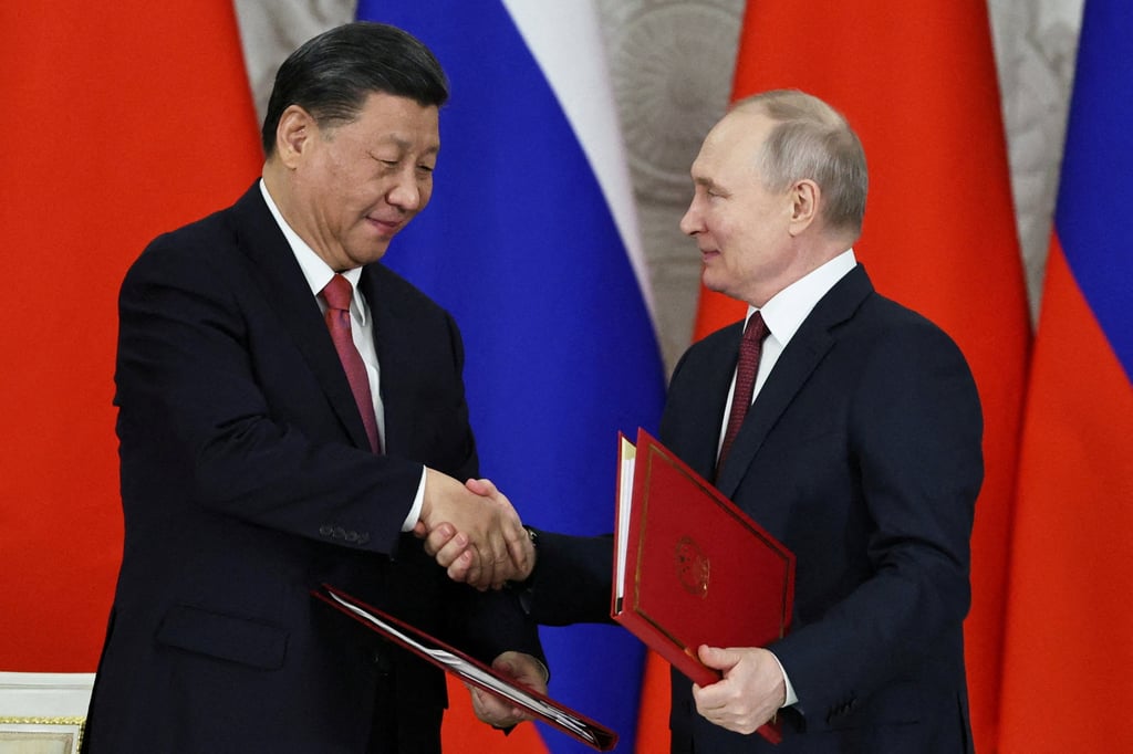 Chinese President Xi Jinping shakes hands with his Russian counterpart Vladimir Putin during talks at the Kremlin in Moscow last month. Photo: Pool via Reuters Chinese President Xi Jinping shakes hands with his Russian counterpart Vladimir Putin during talks at the Kremlin in Moscow last month. Photo: Pool via Reuters