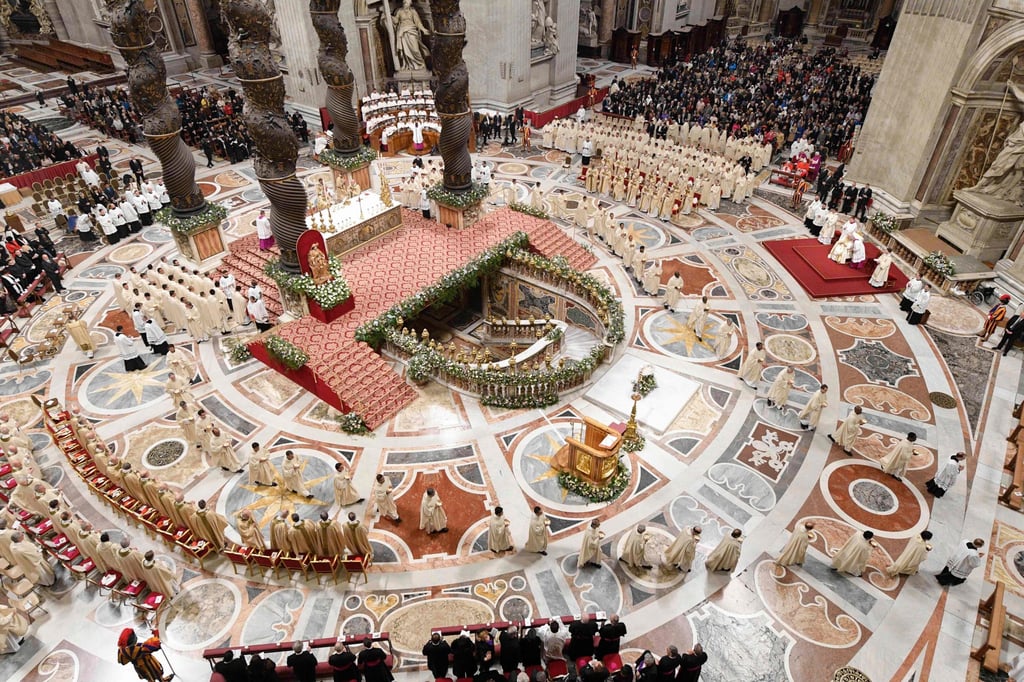 A procession of cardinals, bishops and priests during the Easter Vigil mass at St Peter’s basilica in the Vatican on Saturday. Photo: Handout / Vatican Media / AFP