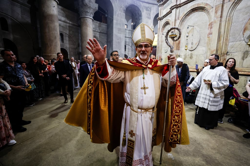 The Latin Patriarch of Jerusalem Pierbattista Pizzaballa gestures as he leads Easter Sunday mass in the Church of the Holy Sepulchre in Jerusalem’s Old City on Sunday. Photo: Reuters