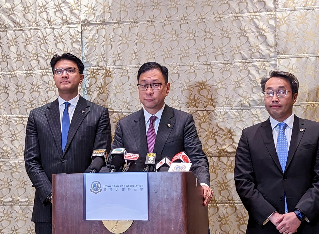 Speaking to the media in Beijing are (left to right) Hong Kong Bar Association vice-chairman Jose Antonio Maurellet, chairman Victor Dawes and vice-chairman Derek Chan Ching-lung. Photo: Kahon Chan Speaking to the media in Beijing are (left to right) Hong Kong Bar Association vice-chairman Jose Antonio Maurellet, chairman Victor Dawes and vice-chairman Derek Chan Ching-lung. Photo: Kahon Chan