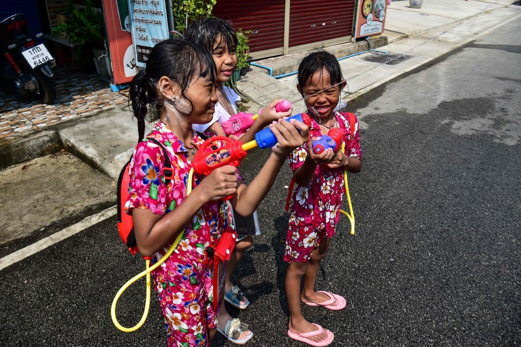 Children take part in water fights as they celebrate the Thai traditional New Year in the southern province of Narathiwat. Photo: AFP Children take part in water fights as they celebrate the Thai traditional New Year in the southern province of Narathiwat. Photo: AFP