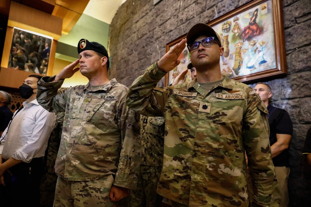 US Army and Air Force soldiers salute during the opening ceremony of the 38th Philippines-US Balikatan exercise at Camp Aguinaldo in Quezon City, Philippines on April 11, 2023. Photo: EPA-EFE