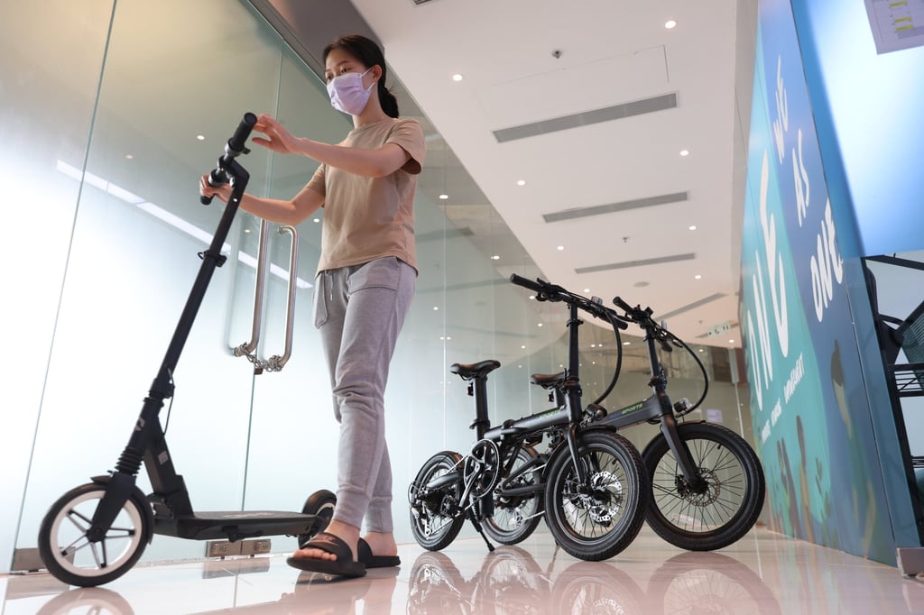 A customer inspects an e-scooter, alongside e-bicycles at a shop in Tuen Mun. Photo: Yik Yeung-man