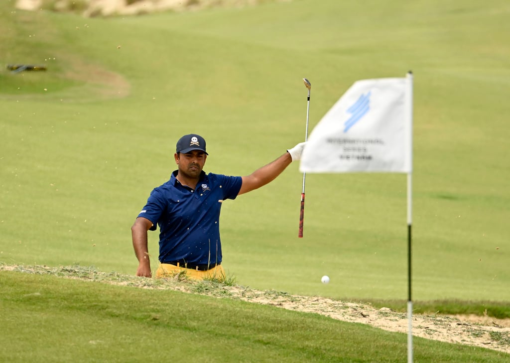 Anirban Lahiri chips out the bunker on 17 during the final round at the KN Golf Links. Photo: Asian Tour Anirban Lahiri chips out the bunker on 17 during the final round at the KN Golf Links. Photo: Asian Tour