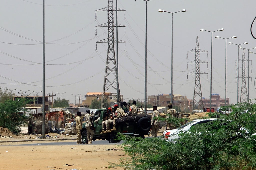 Army soldiers deploy in Khartoum as clashes are reported on Saturday. Photo: AFP Army soldiers deploy in Khartoum as clashes are reported on Saturday. Photo: AFP