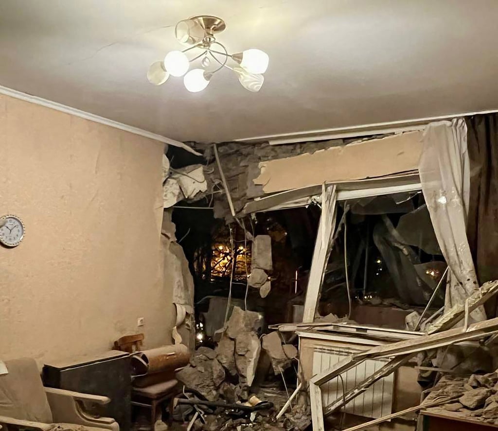 The inside of a damaged building is seen after an explosion in Belgorod, Russia on Thursday. Photo: Telegram/@vvgladkov via AFP
