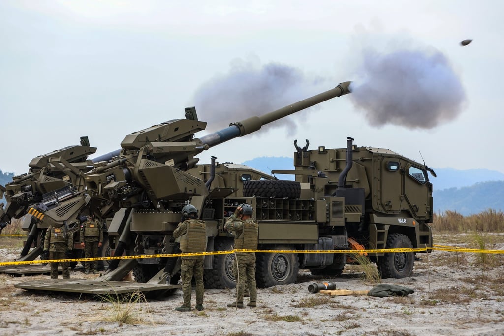 Filipino soldiers fire artillery shells using self-propelled artillery vehicles during a combined live-fire exercise as part of the Balikatan military exercises. Photo: Zuma Press Wire/dpa