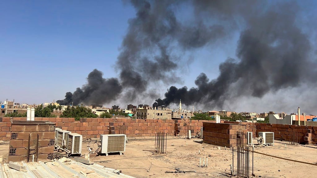 Smoke fills the sky in Khartoum, Sudan, near Doha International Hospital on Friday. Photo: Maheen S via AP