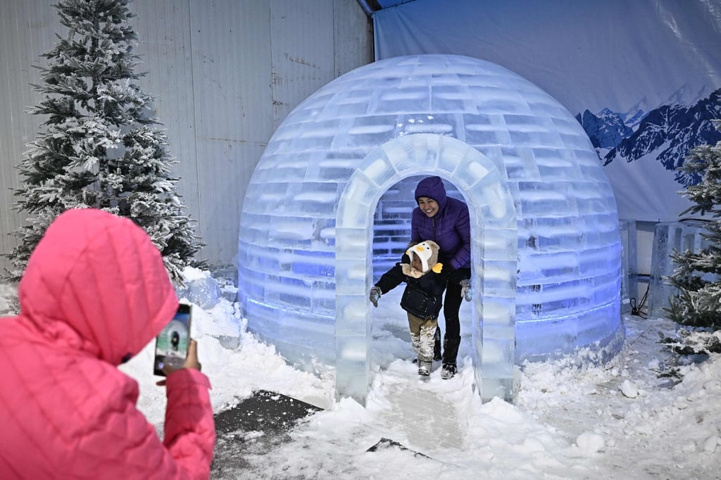 Visitors at the Ice Magic: Fantasy On Ice indoor event in Bangkok, amid a heatwave across the region. Photo: AFP