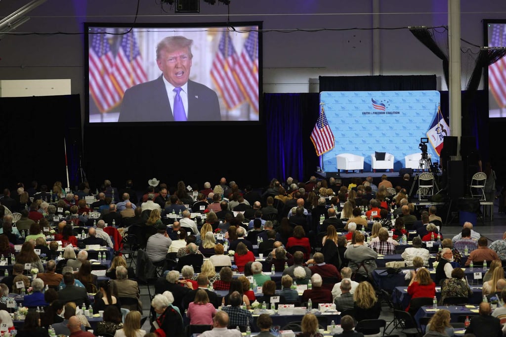 Former US President Donald Trump speaks to guests via video link at the Iowa Faith & Freedom Coalition Spring Kick-Off. Photo: AFP