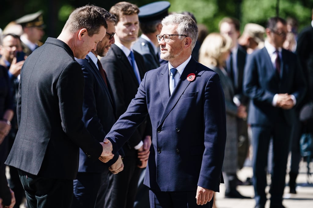 Ukrainian ambassador to Germany Andrij Melnyk, right, shakes hands with Berlin culture senator Klaus Lederer in Berlin, Germany in May 2022. Melnyk on Saturday called on allies for more military aid to fight Russia. Photo: EPA-EFE