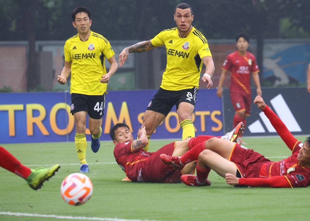 Everton Camargo (centre) scores his side’s first against Sham Shui Po. Photo: Dickson Lee