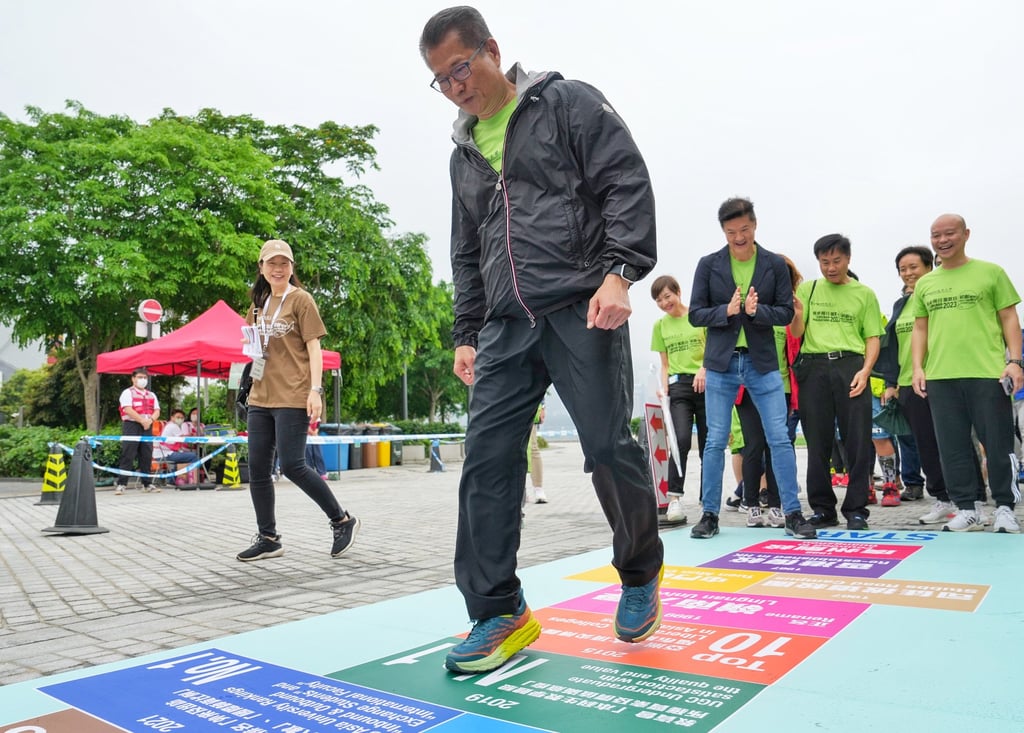 Financial Secretary Paul Chan starts a fundraising walk organised by Lingnan University. Photo: Elson Li