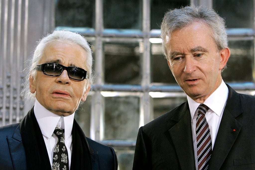 Karl Lagerfeld (left) and French luxury goods group LVMH chief executive Bernard Arnault pose inside the new Palazzo Fendi in central Rome, in 2005. Photo: AFP