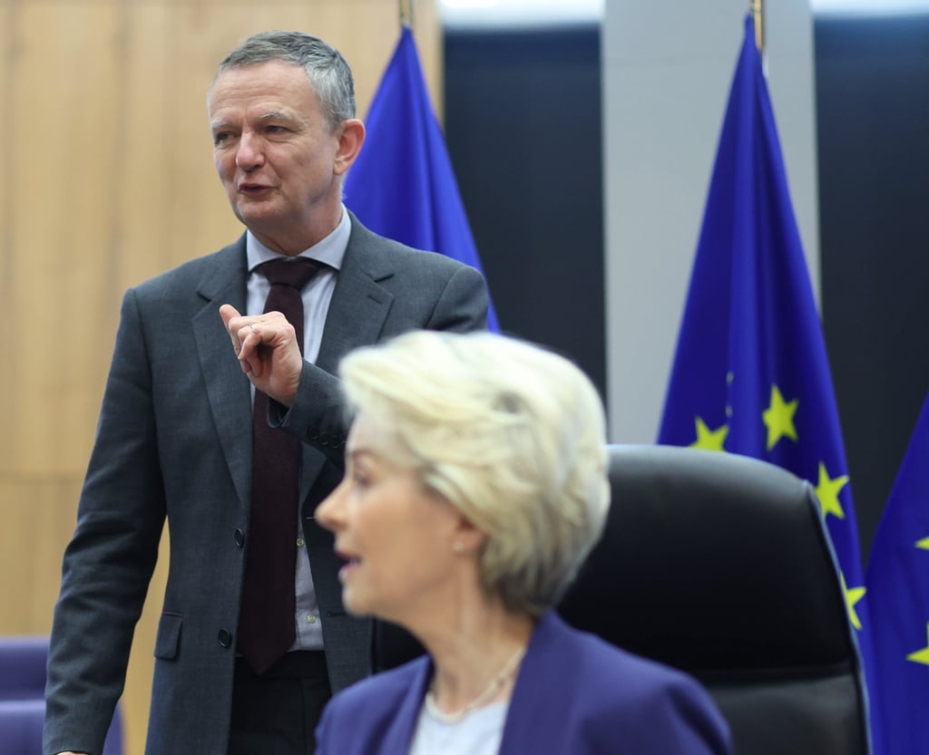 Eric Mamer, chief spokesman for the European Commission, standing behind European Commission President Ursula von der Leyen on Wednesday. Photo: EPA-EFE