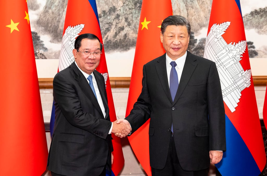 Chinese President Xi Jinping shakes hands with Cambodia’s Prime Minister Hun Sen in February. Beijing sees its friendship with Cambodia as a “model for international relations”. Photo: Xinhua