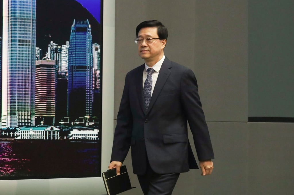 John Lee addresses reporters at government headquarters in Admiralty. Photo: Xiaomei Chen John Lee addresses reporters at government headquarters in Admiralty. Photo: Xiaomei Chen