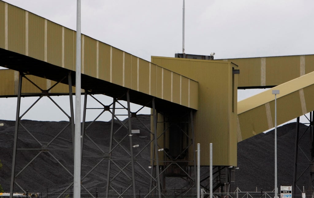 Coal waiting to be loaded onto ships at the Port of Brisbane. Australian miners have found new customers since China imposed restrictions on coal imports. Photo: Reuters Coal waiting to be loaded onto ships at the Port of Brisbane. Australian miners have found new customers since China imposed restrictions on coal imports. Photo: Reuters
