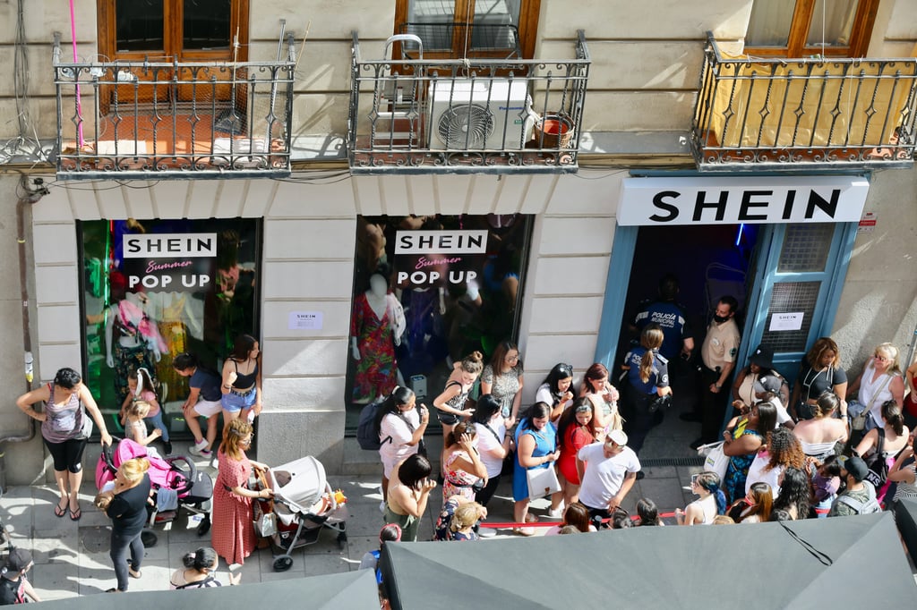 Several people wait to enter SHEIN’s first physical store in Madrid, on 02 June, 2022 in Madrid, Spain. Photo: Getty Images