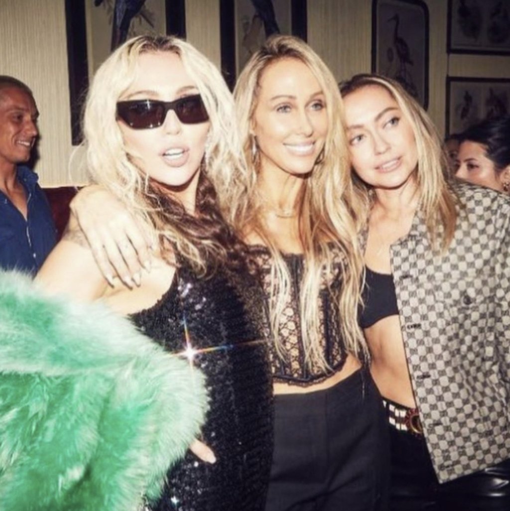 Miley, Tish and Brandi Cyrus at the Gucci Osteria da Massimo Bottura in March. Photo: @brandicyrus/Instagram