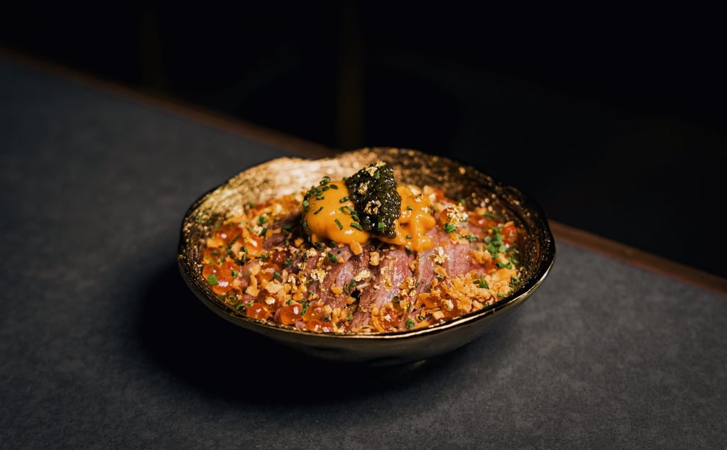 A dish Hatoum cooked for a recent four-hands dinner, The Golden Bowl – black truffle foie gras rice topped with A4 Kagoshima wagyu, Hokkaido sea urchin, Osetra caviar, salmon roe, and 18-carat gold flakes. Photo: RH Fine Dining A dish Hatoum cooked for a recent four-hands dinner, The Golden Bowl – black truffle foie gras rice topped with A4 Kagoshima wagyu, Hokkaido sea urchin, Osetra caviar, salmon roe, and 18-carat gold flakes. Photo: RH Fine Dining