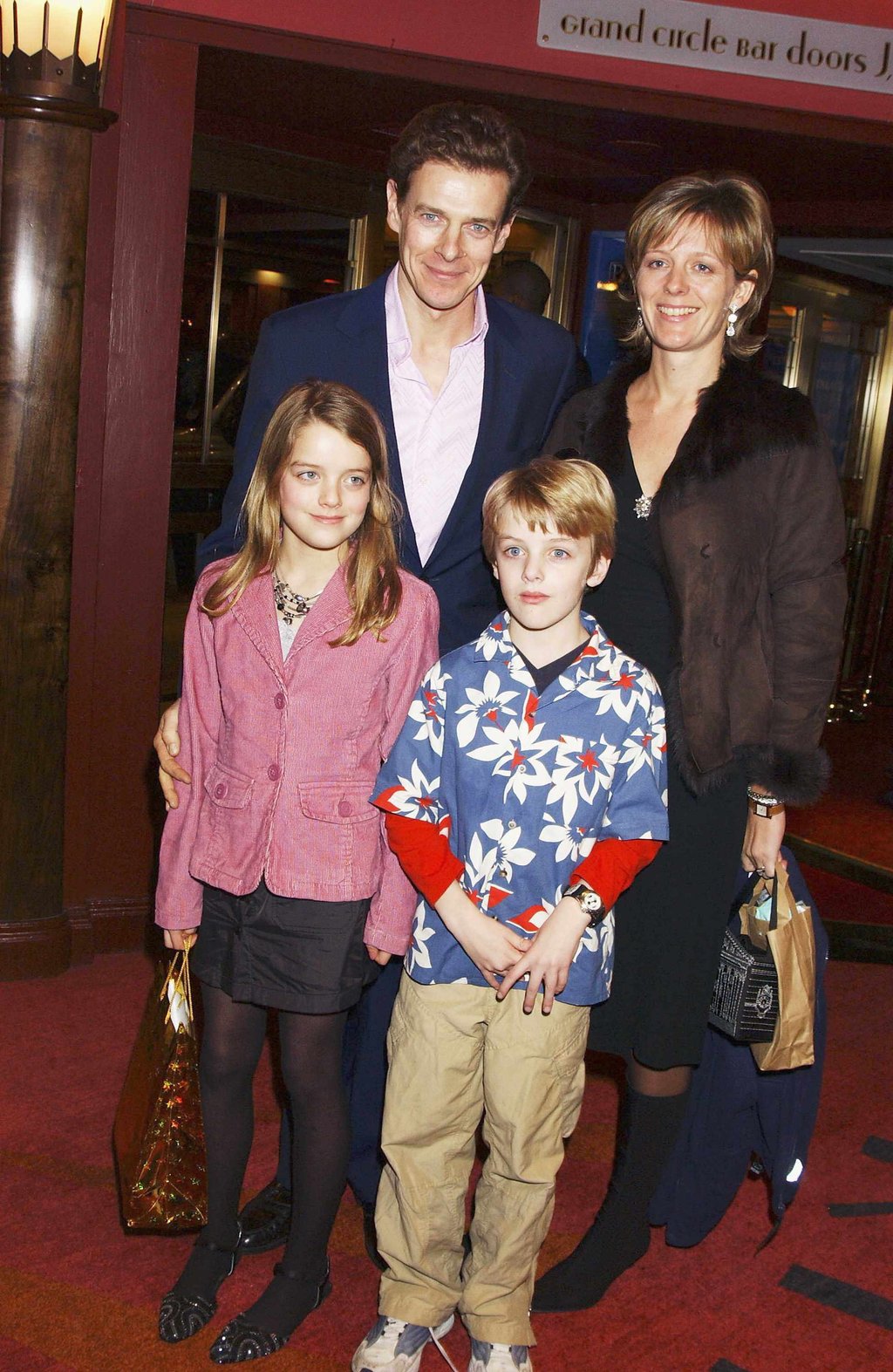 Alex Ogilvy with his parents James and Julie back in the day. Photo: Getty Images Alex Ogilvy with his parents James and Julie back in the day. Photo: Getty Images