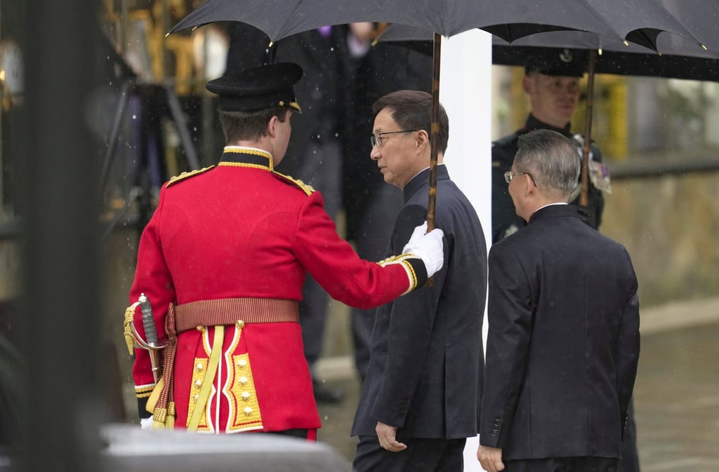 Chinese vice-president Han Zheng arrives at Westminster Abbey ahead of Saturday’s coronation service. Photo: AP