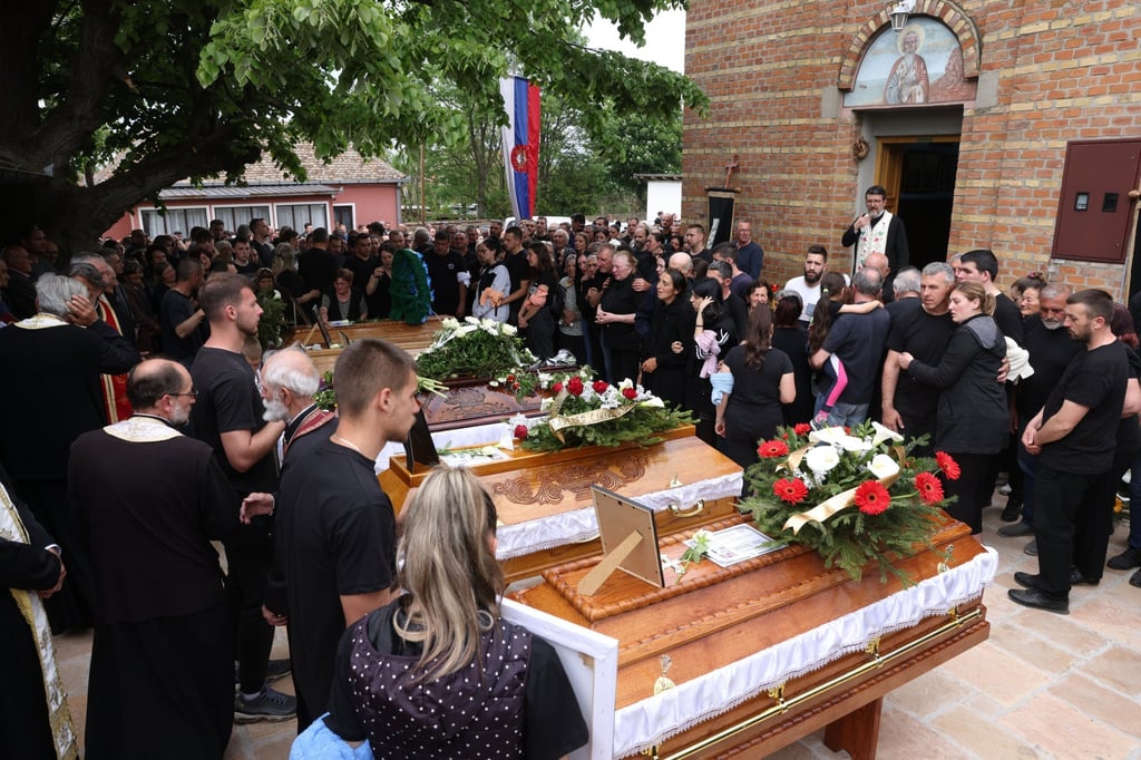 Relatives of victims of a mass shooting during a funeral service in the village Malo Orasje, near Mladenovac, Serbia on Saturday. Photo: EPA-EFE