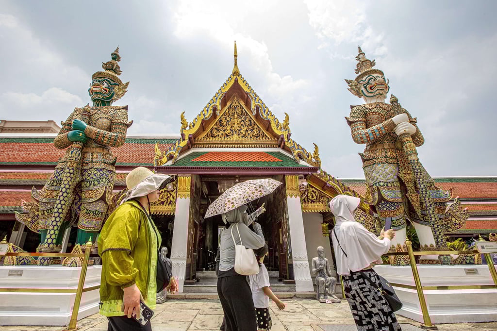 Chinese tourists visit The Grand Palace in Bangkok on May 1. Thailand was the most popular outbound destination for travellers from mainland China during the May labour day holiday. Photo: Xinhua
