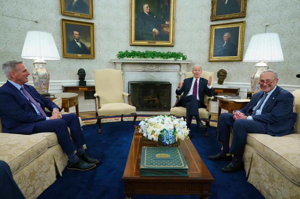 US Speaker of the House Kevin McCarthy (left) and Senate Majority Leader Chuck Schumer (right) listen as President Joe Biden speaks before a meeting on the debt limit in the Oval Office on Tuesday. Photo: AP